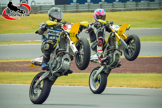 Just as he was on debut in New Zealand last season, England’s Davey Todd (right) was again among the frontrunners in the Suzuki International Series as the 2024 edition kicked off in Taupo at the weekend. Here he is pulling a wheelie alongside defending supermoto champion and class winner Richie Dibben, of Whanganui. Photo by Andy McGechan, BikesportNZ.com 