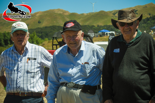 Woodville Motocross co-founder Tim Gibbes (centre), flanked by fellow ‘Woodville legends’ Ken Cleghorn (left), Gibbes’ brother-in-law and the winner of the first Woodville event in 1961, and Kevin Eagle at the 60th anniversary of the iconic event four years ago (in 2021). Photo by Andy McGechan, BikesportNZ.com